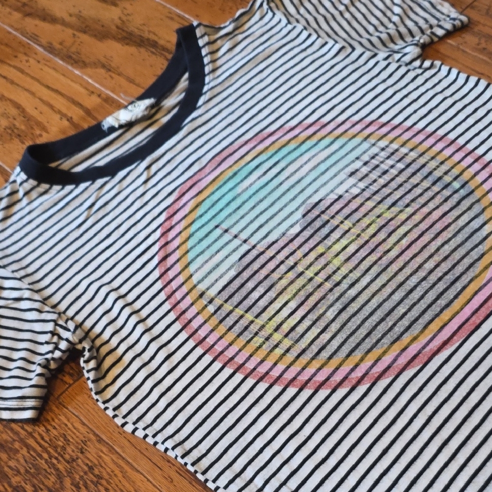 Modish Rebel Black and White Striped Tee with Colorful Desert Scene Graphic